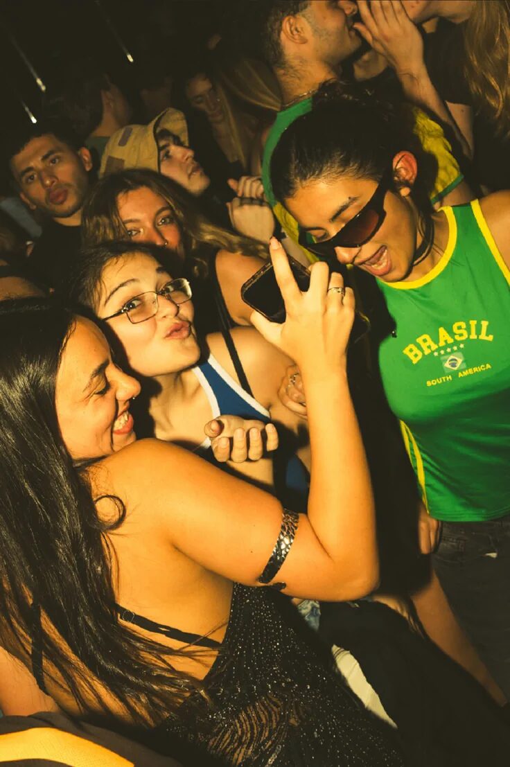 Crowd with hands up at a big night